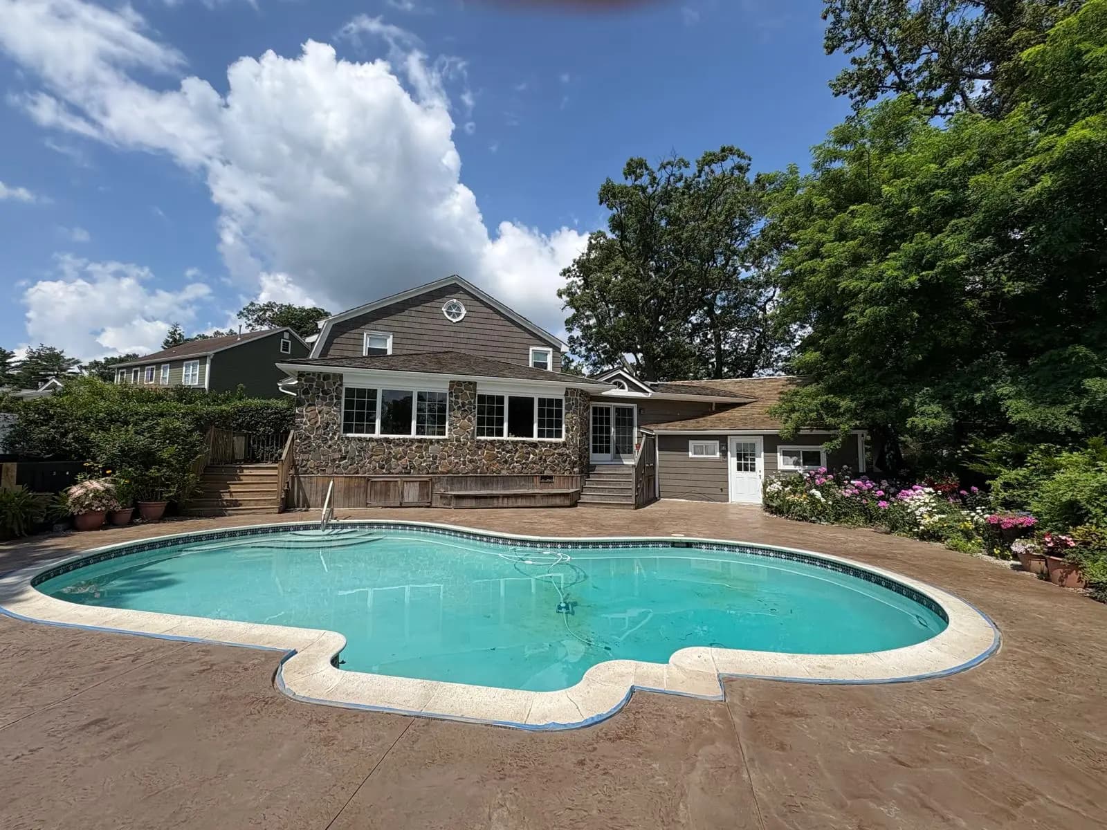 TopCoat LLC worker applying decorative concrete